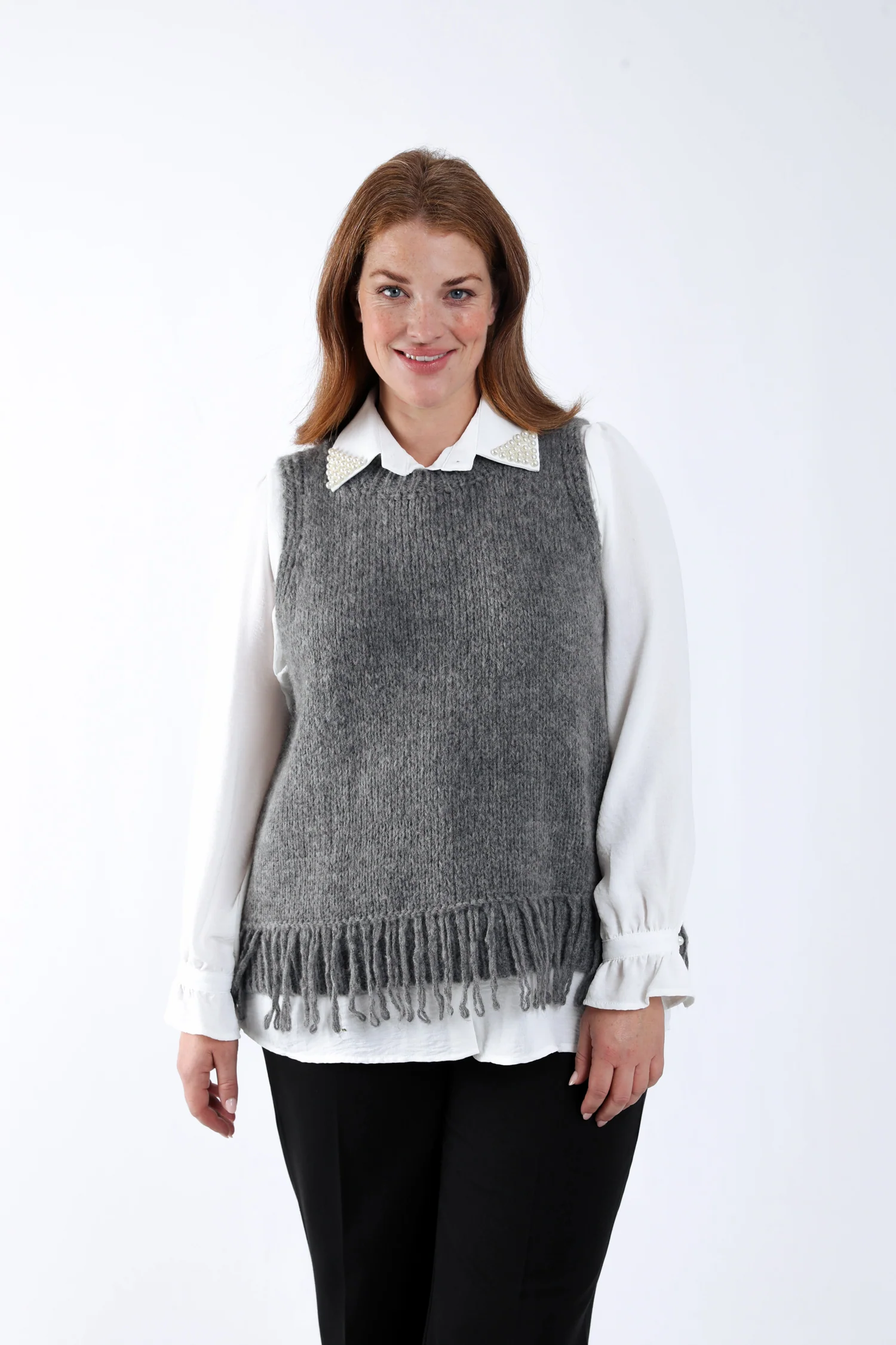 Pull sans manches uni à franges